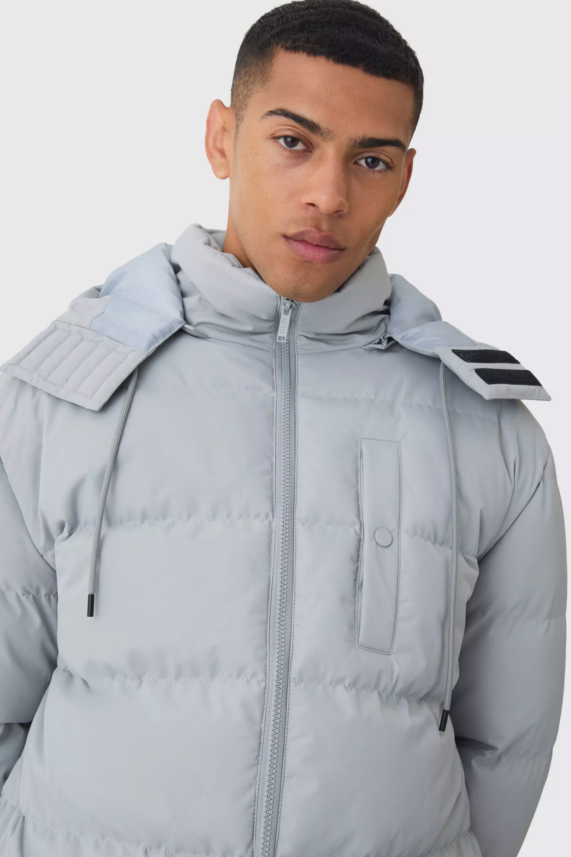 Longline Hooded Puffer Coat In Grey boohooMAN IE